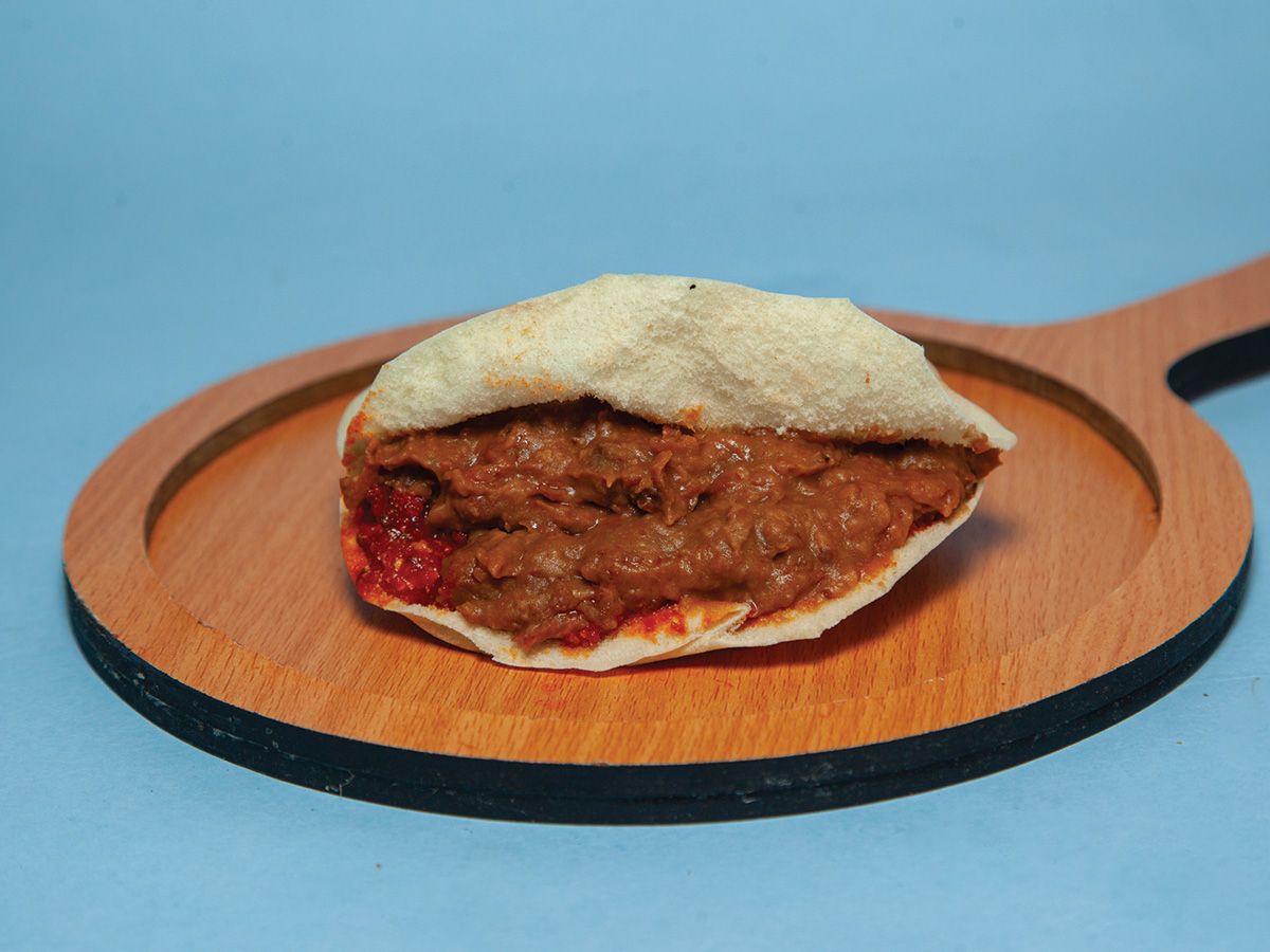 Foul with shakshuka sandwich