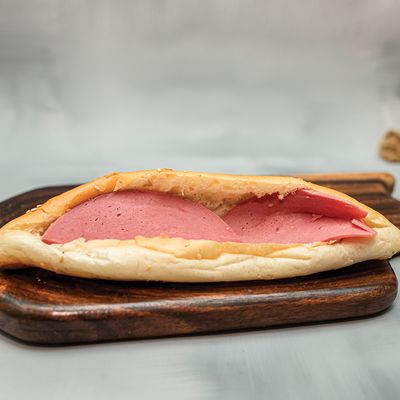 Triangle cheese sandwich with Halawani luncheon