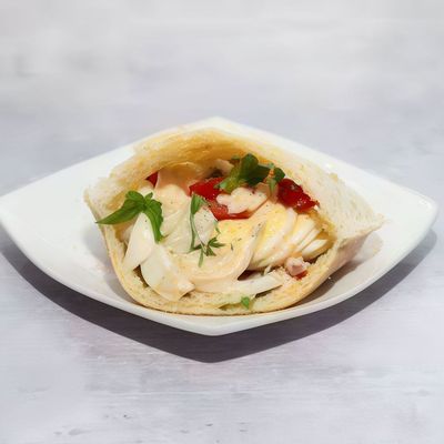 Boiled egg sandwich with cheese and tomato