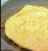 Foul with eggs omelette