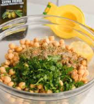 Spiced hummus container with olive oil
