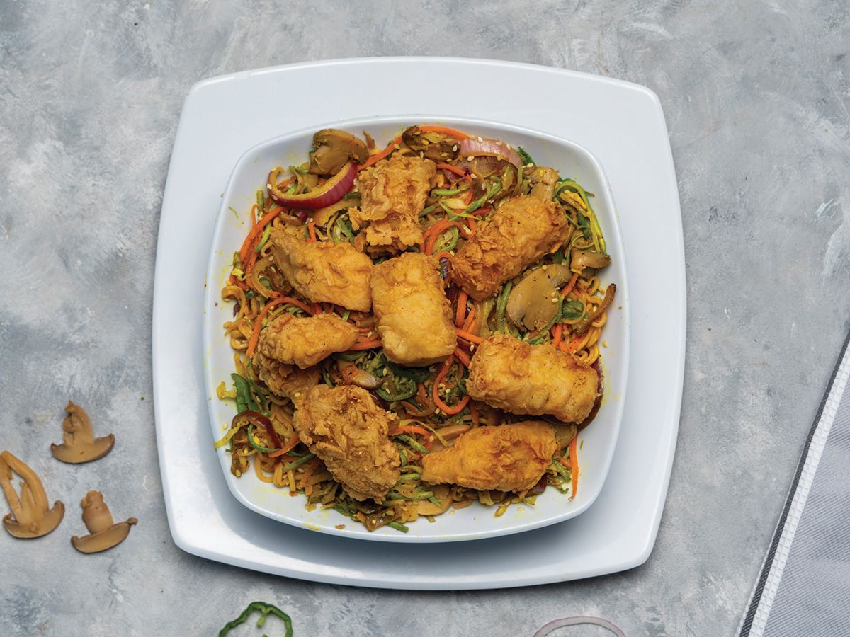 Fried noodles with marinated and fried fish fillet
