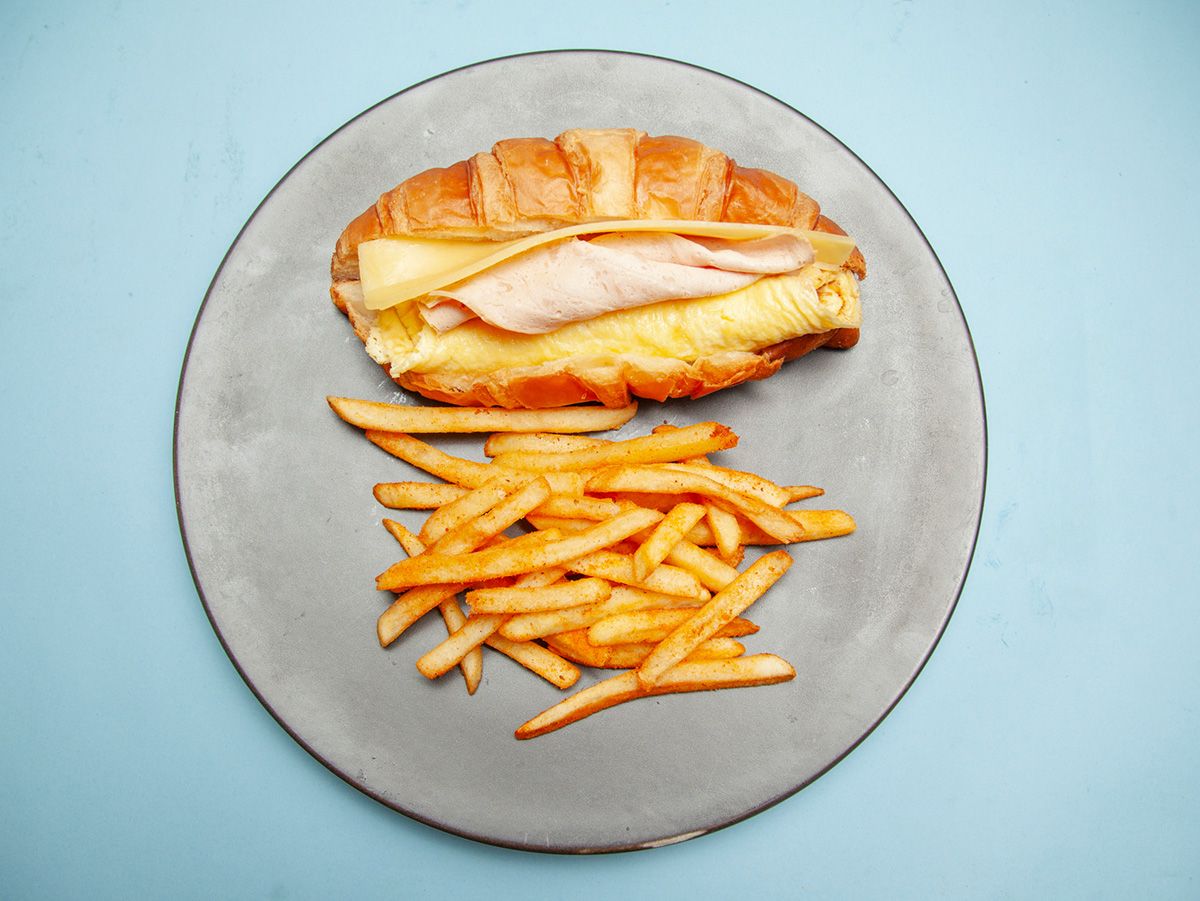 Croissant With Turkey And Cheddar Omelet