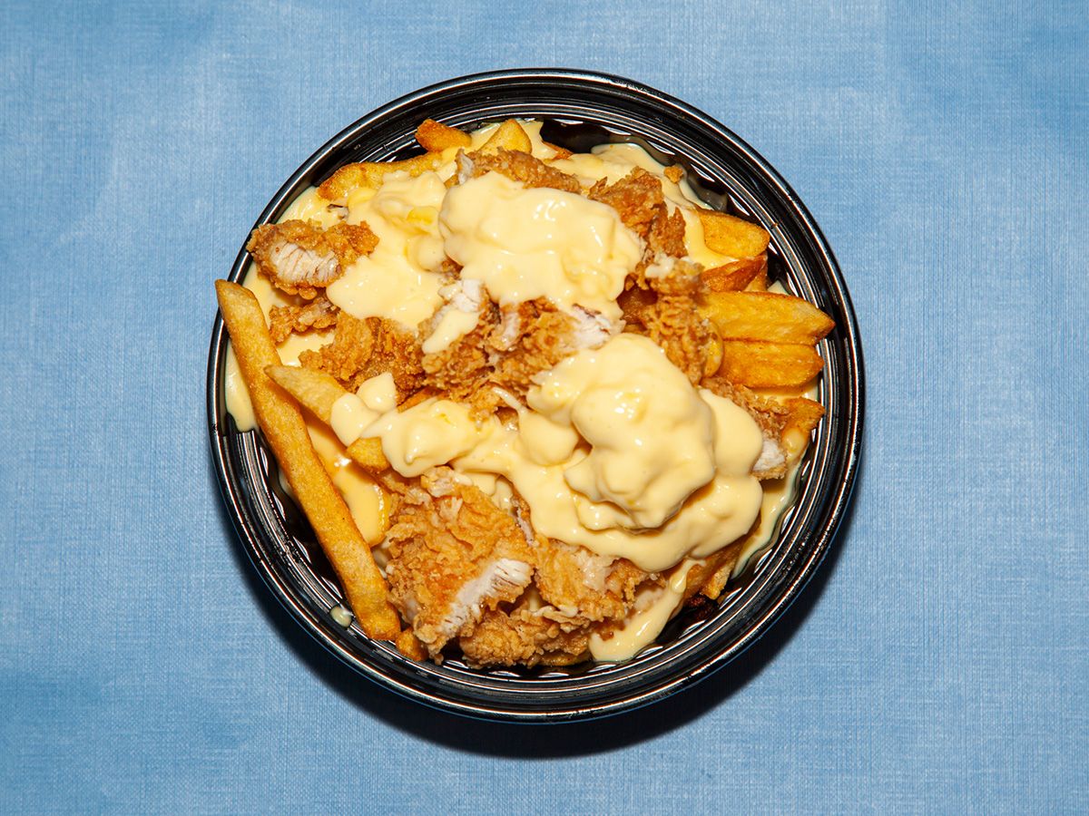 French Fries With Crispy Chicken Cheese Sauce