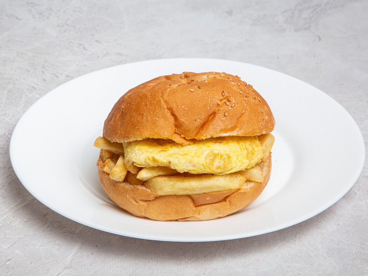 potatoes omelette eggs bun or french Sandwich