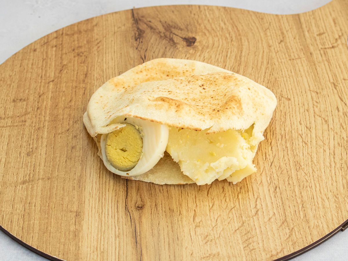 Mashed Sandwich On Boiled Eggs