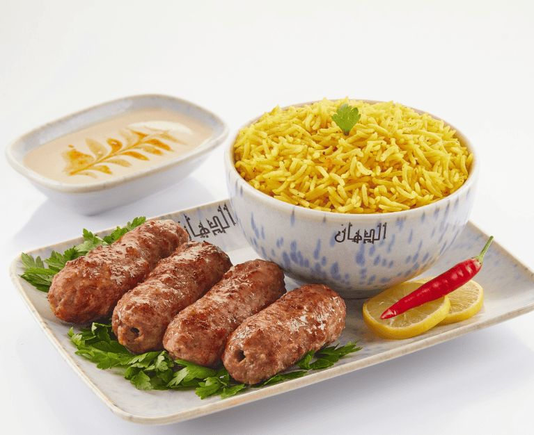 Quarter of kofta with basmati rice and salad