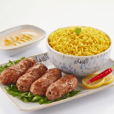 Quarter of kofta with basmati rice and salad
