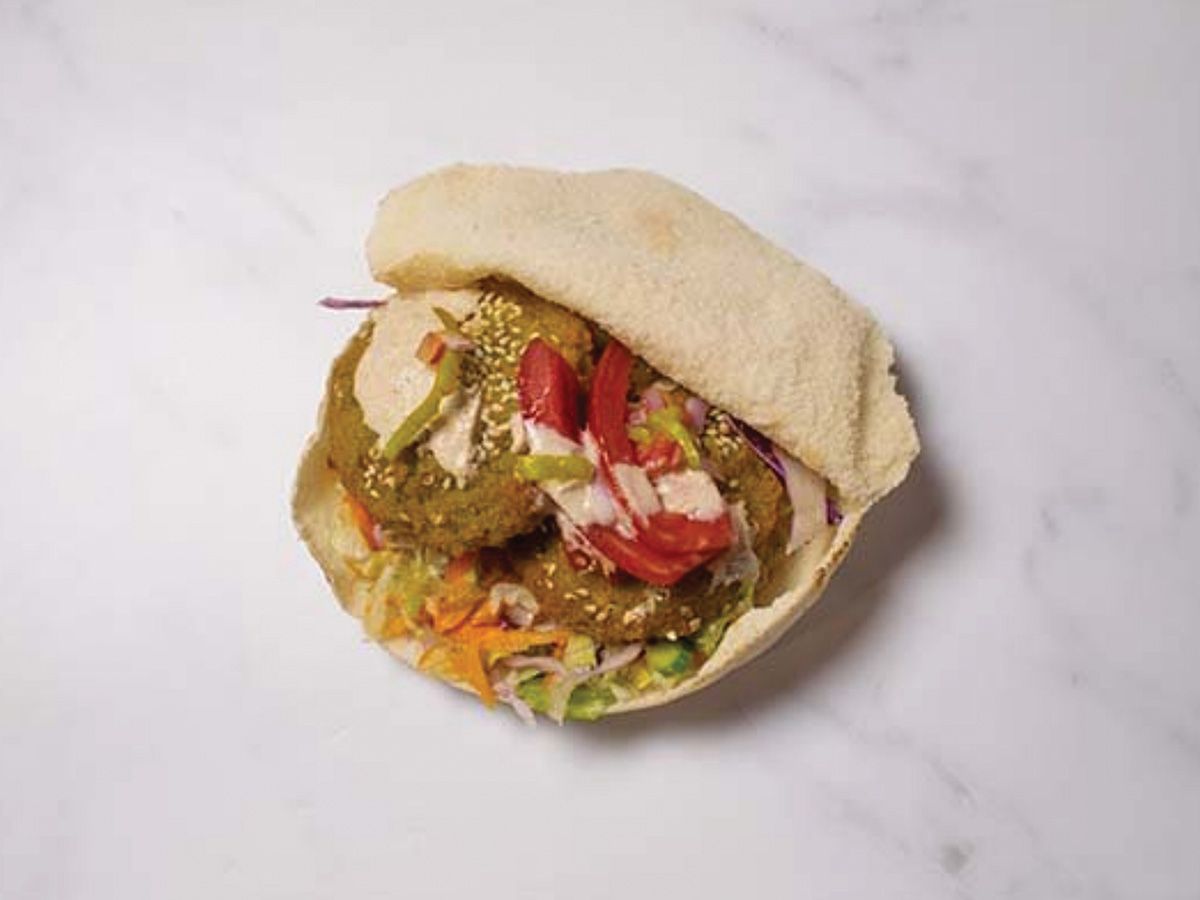 Foul on falafel sandwich
