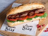Grilled Oriental Sausage With P Molases Sandwich