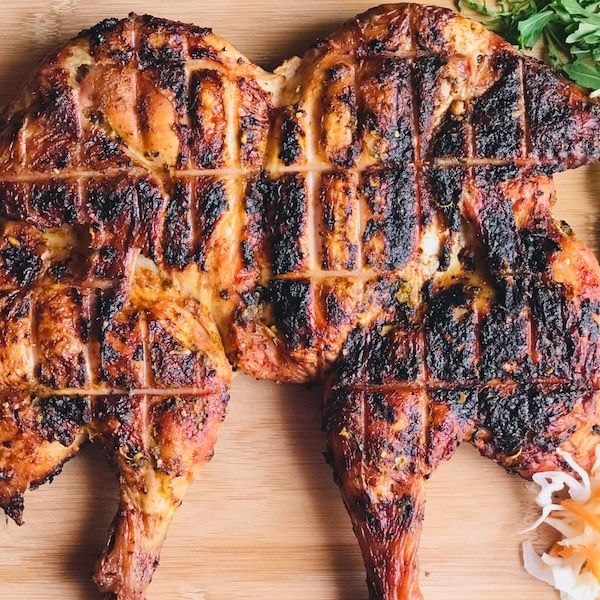 Grilled chicken on charcoal