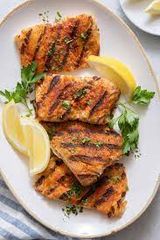 Grilled fillet meal on charcoal