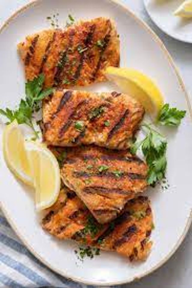 Grilled fillet meal on charcoal