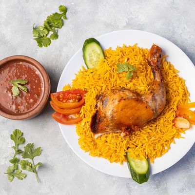 quarter mandi chicken, rice and sauce