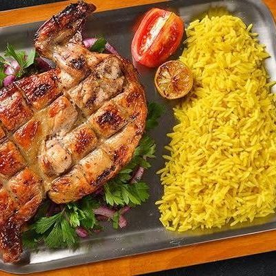 Half chicken on charcoal with rice