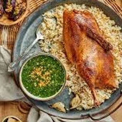 Half duck with rice and molokhia