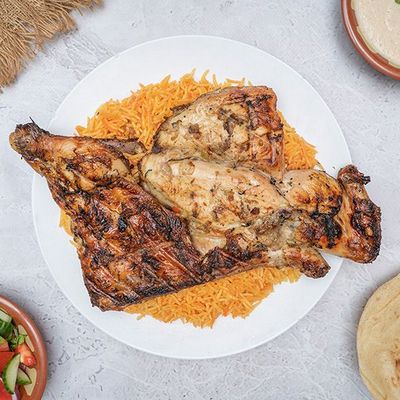 1/2 grilled chicken with 2 kofta sticks and rice