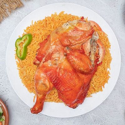 Half Mandi chicken with rice and sauce
