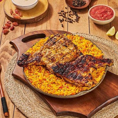 Half chicken grilled with rice