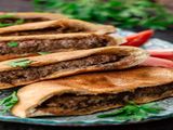 Hawawshi Loaf With Roumi Cheese And Olives