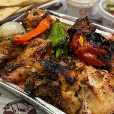 عرض دجاجة كاملة مع نصف كيلو أرز بسمتي