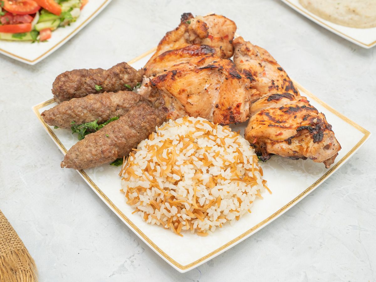 A Quarter Grilled Chicken And One-eighth Of A Rice Kofta