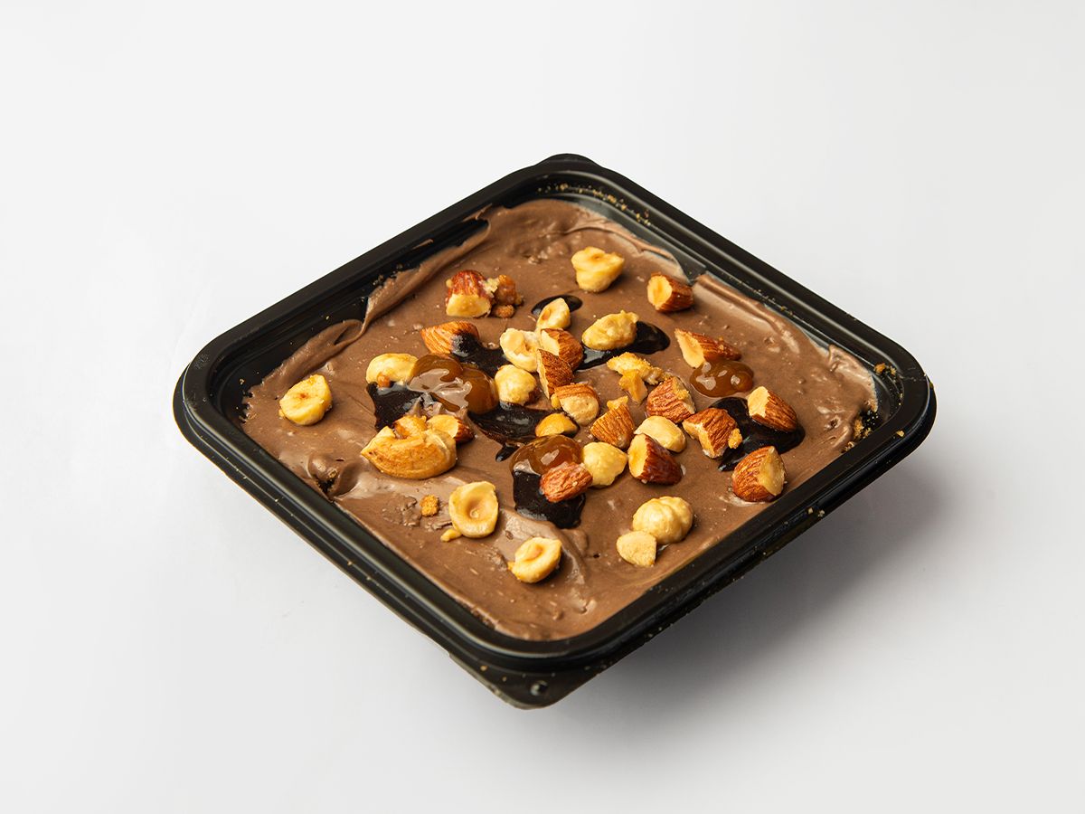Rice pudding with Nutella chocolate and hazelnuts