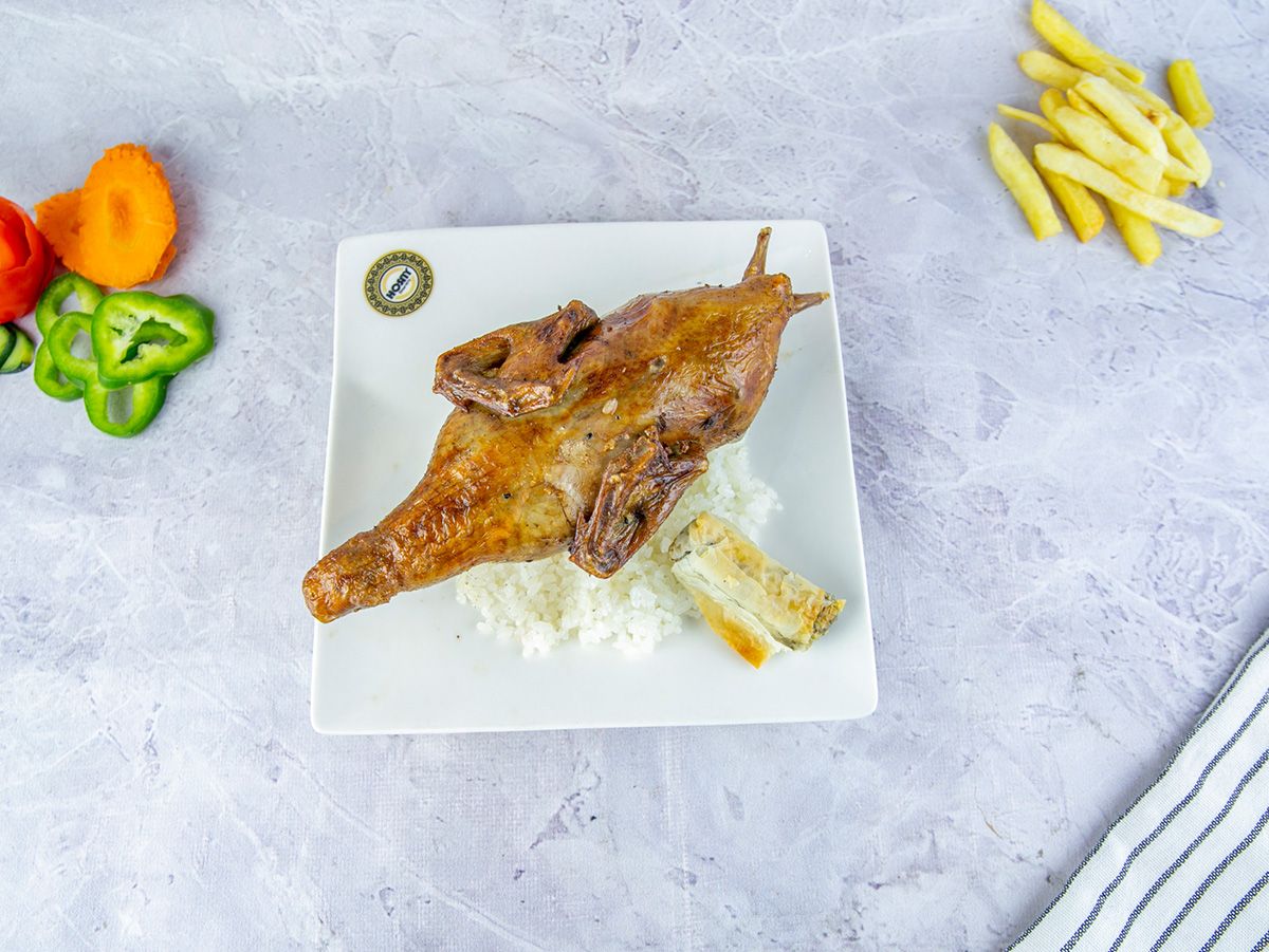 Stuffed Whole Duck With Rice And Khalta
