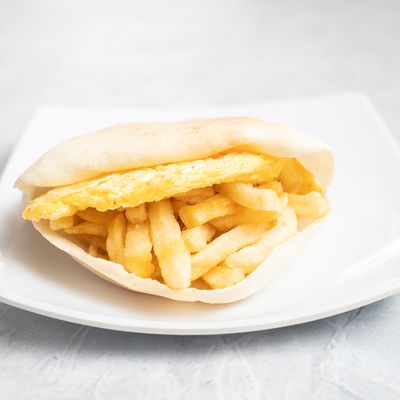 Potatoes with fried eggs