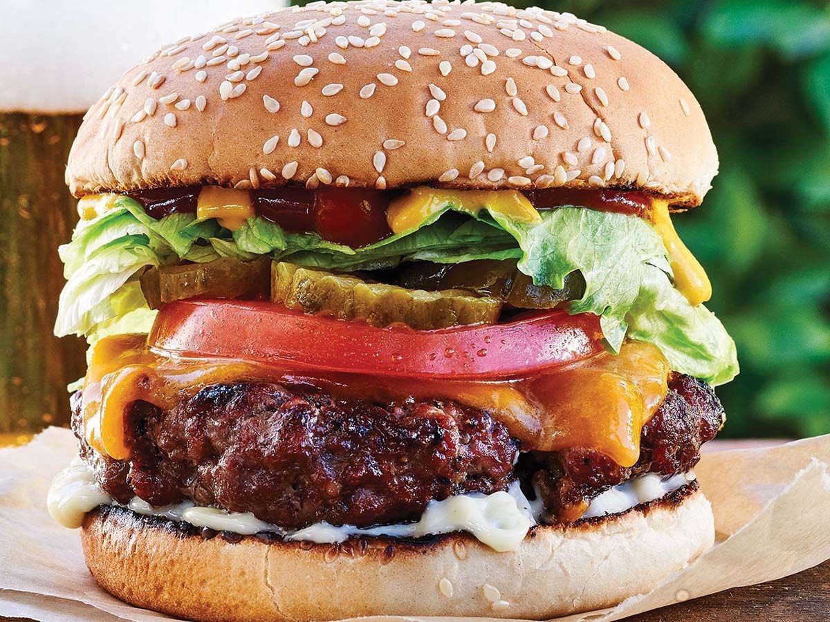 Meat burger sandwich with eggs and cheese