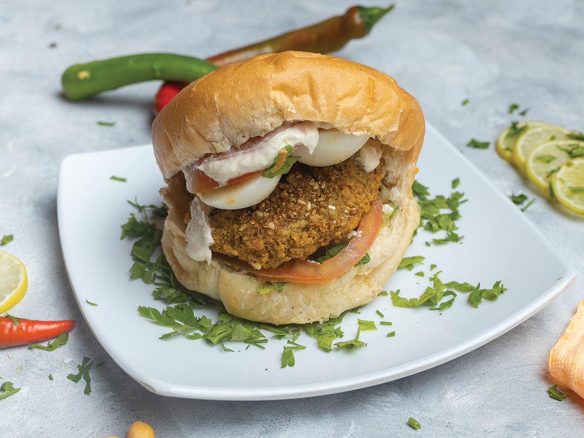 Falafel burger with egg in kaiser bread