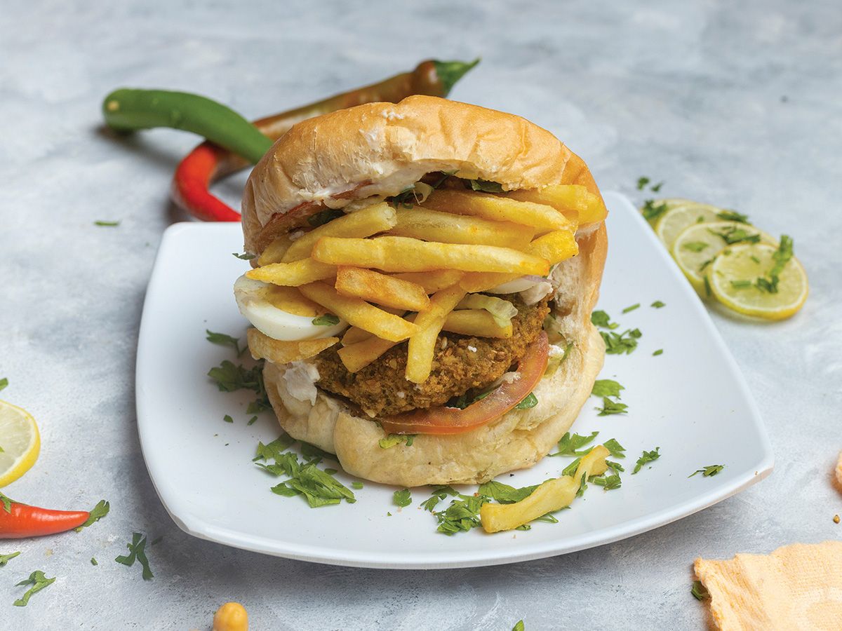 Jumbo falafel with potatoes in a Kaiser roll
