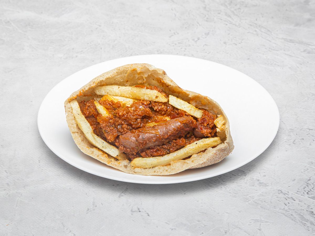 Foul sandwich with falafel and cheese sauce