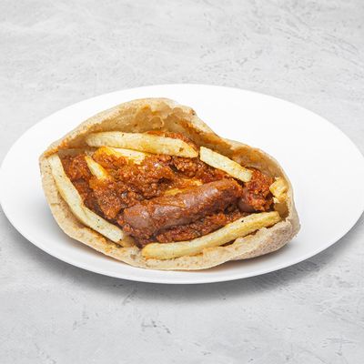Foul sandwich with falafel and cheese sauce