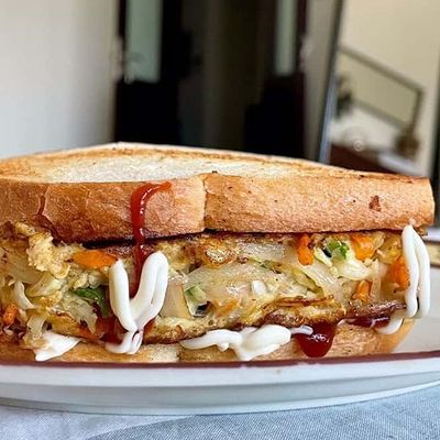 Omelet Finger Potatoes With Ketchup And Mayonnaise Sandwich