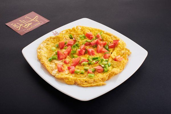 Cheese Omelet With Pepper And Tomatoes