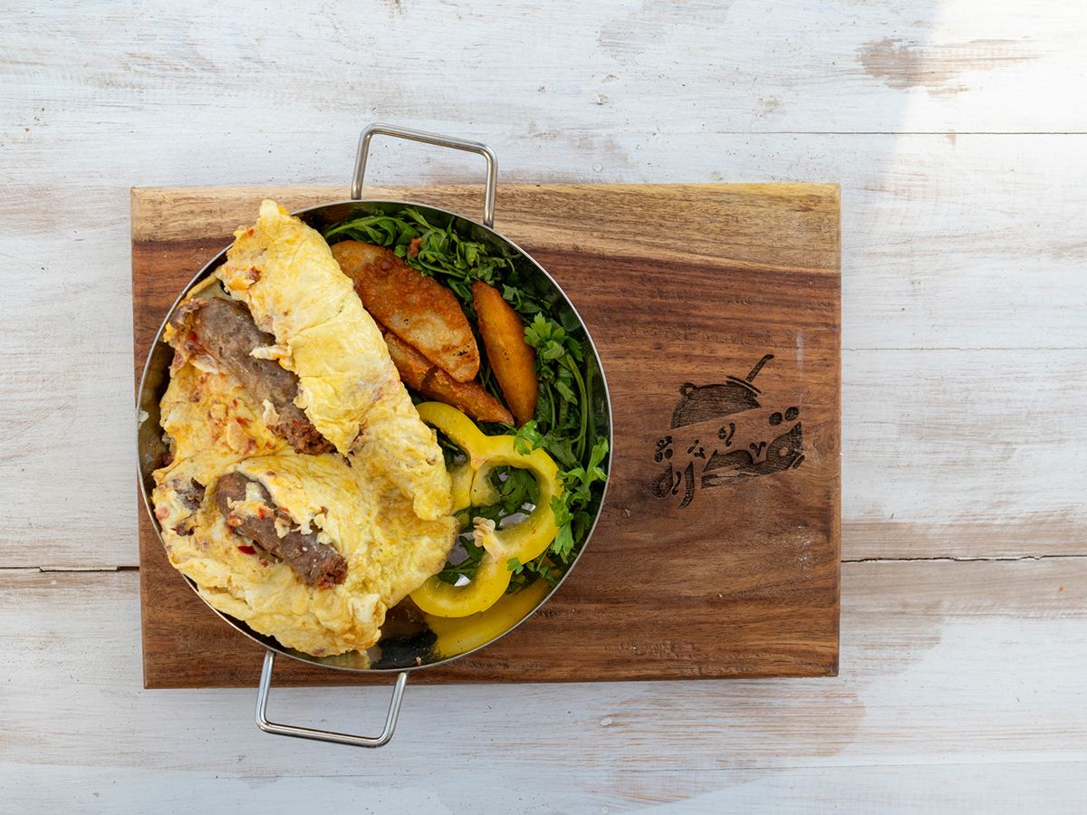 Omelette sausage sandwich
