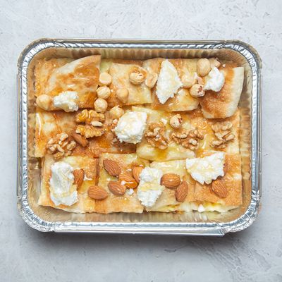 Qeshta, honey and nuts feteera