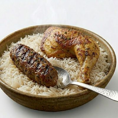 Quarter chicken, kofta piece, and rice