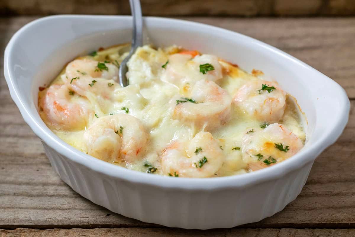 Pasta Casserole With Shrimp With White Sauce And Mozzarella