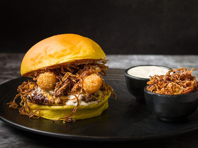 Yellow Taxi For Burger delivery service in Bahrain Talabat