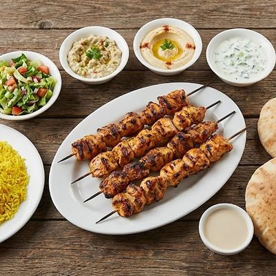 3/4 chicken shish on charcoal
