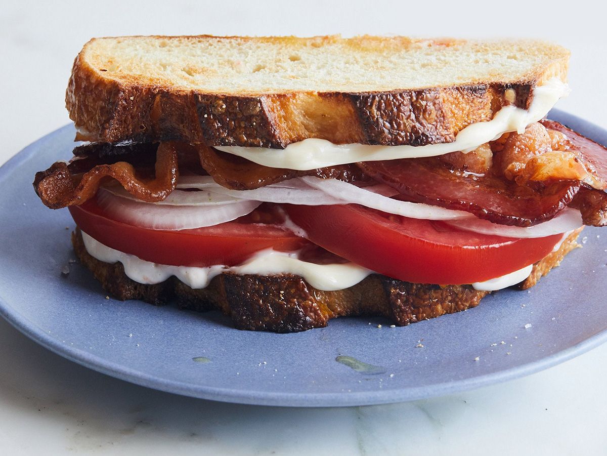 Tomato slices fingers sandwich