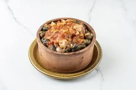 Stuffed vine leaves tagine with oxtail