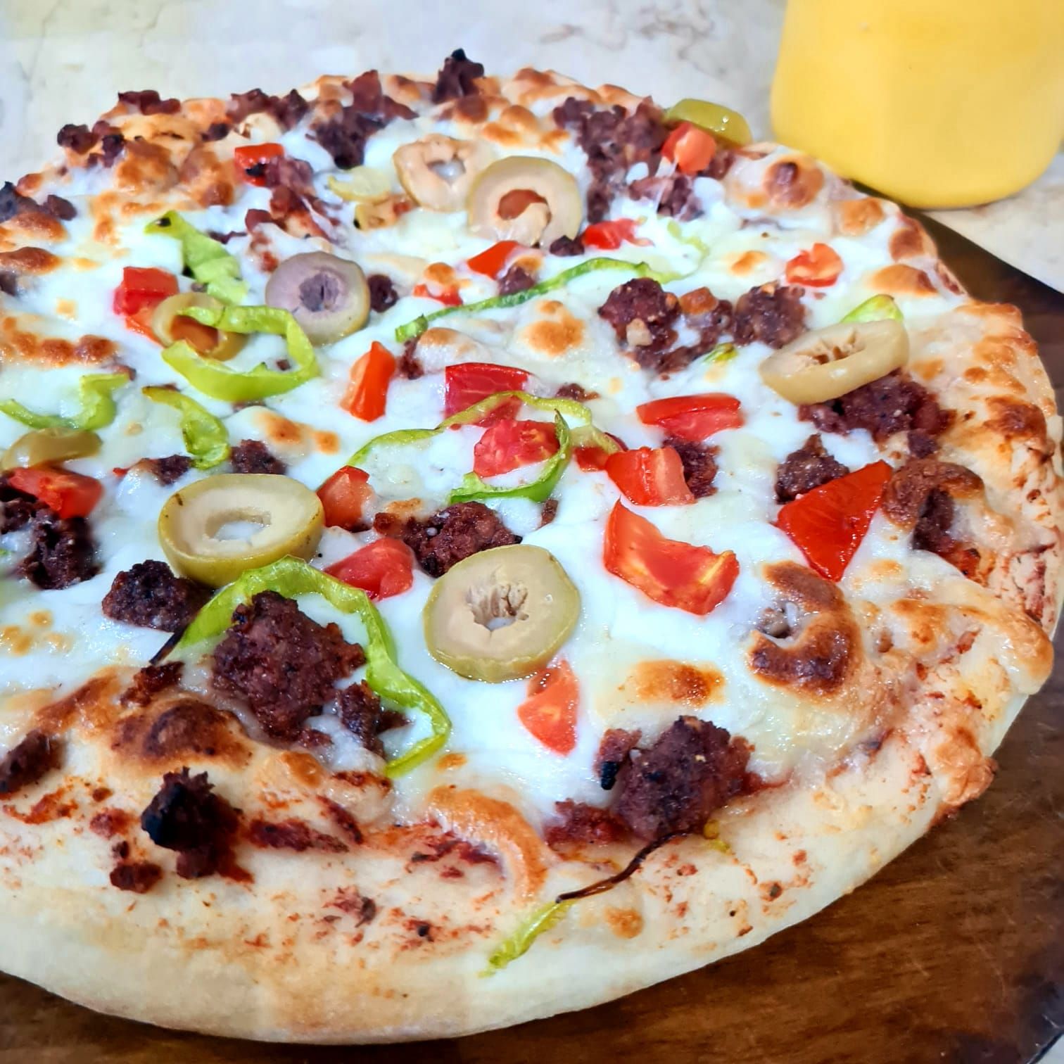 Alexandrian sausage pizza