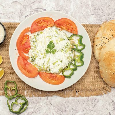 White cheese with tomato dish