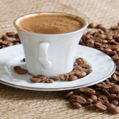 A hot drink of Yemeni coffee with milk