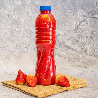زجاجة عصير فراولة