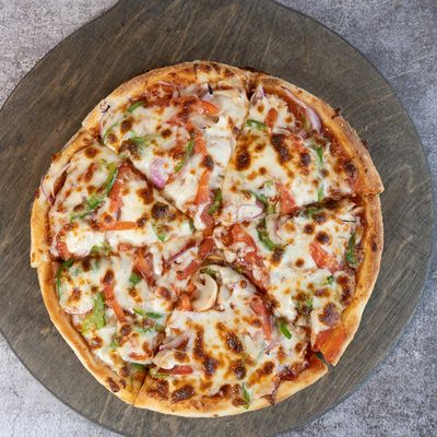 Large vegetable oriental pizza