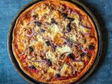 Tuna Pizza With Marinated Onion Slices Upon Request